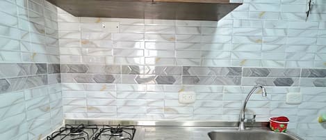 Chambre Double Confort, vue ville | Cuisine privée
