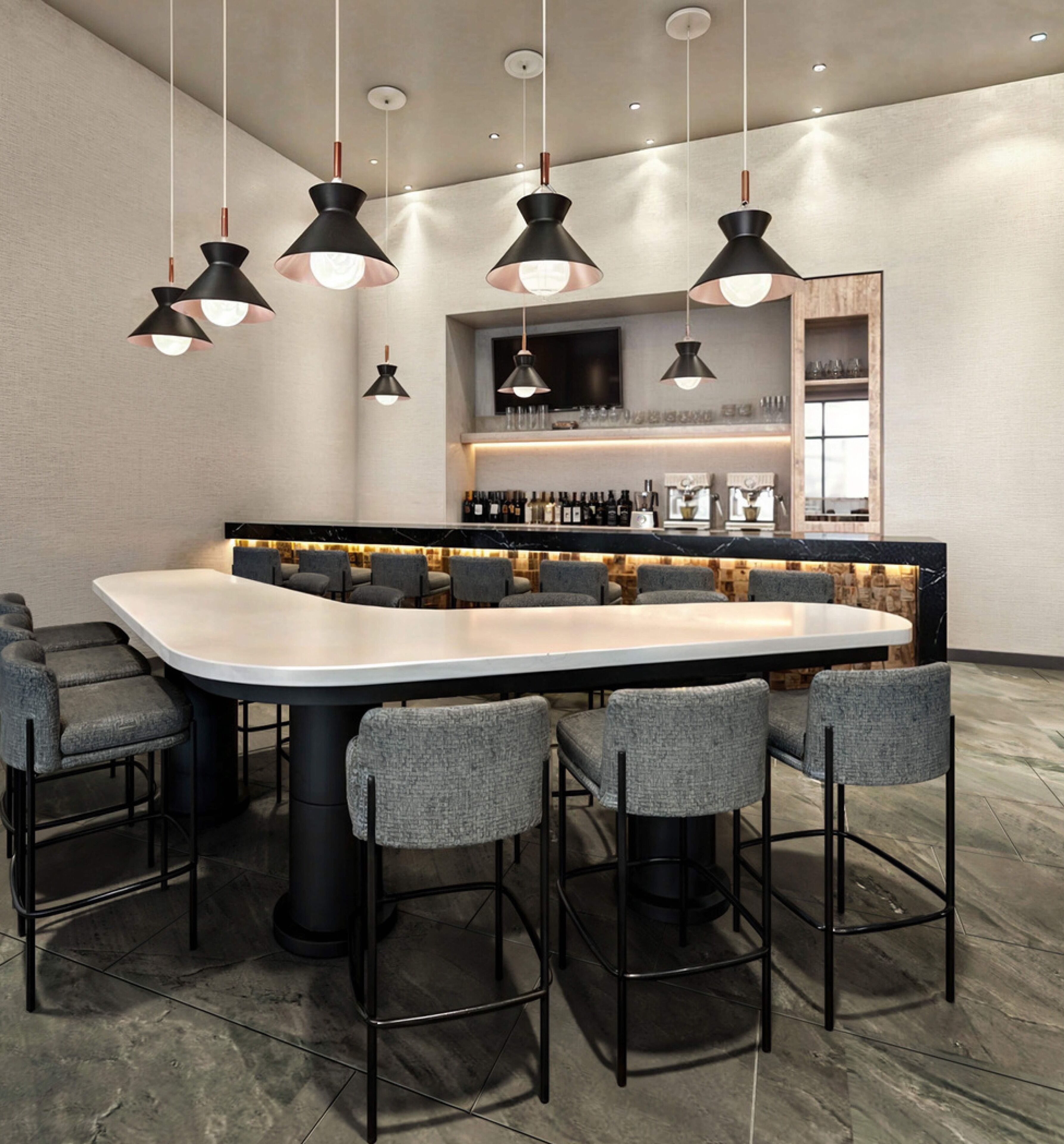 A modern bar area with a central island, bar stools, and hanging pendant lights.