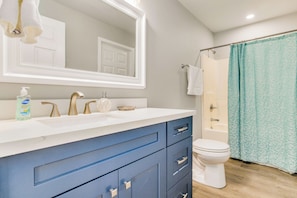 Hair dryer, towels, soap, toilet paper