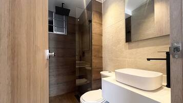Shower, towels, soap, toilet paper