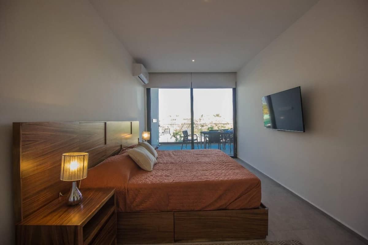 Căn hộ Deluxe, 2 phòng ngủ, ban công, quang cảnh resort | 2 phòng ngủ, truy cập Internet không dây miễn phí, bộ trải giường
