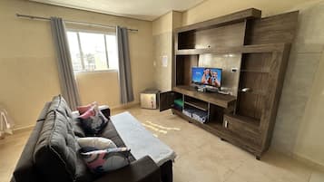 Grand Studio | Living area | 32-inch Smart TV with digital channels, Netflix, streaming services