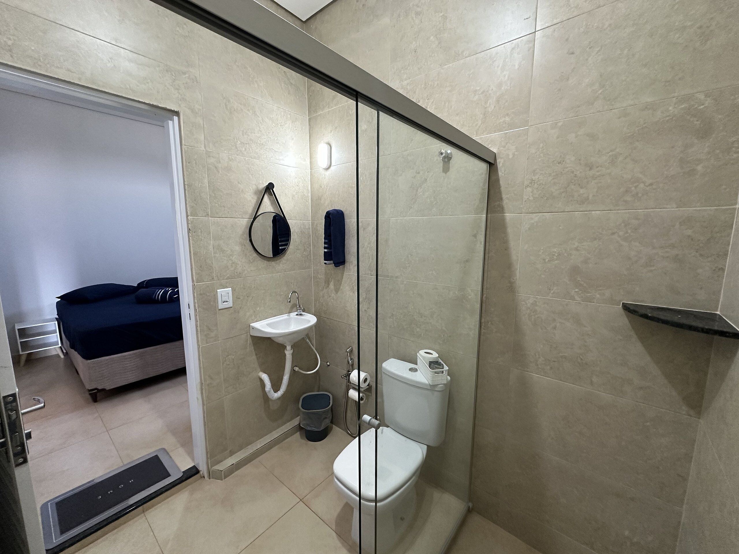 Basic Suite | Bathroom | Shower, towels, toilet paper