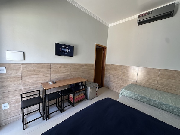 Suíte premium | Wi-Fi de cortesia, roupa de cama