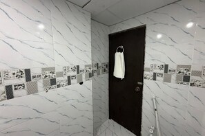 Shower, bidet, towels, soap