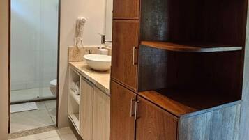 Deluxe Apartment, Garden View | Bathroom | Hair dryer, bathrobes, soap, shampoo