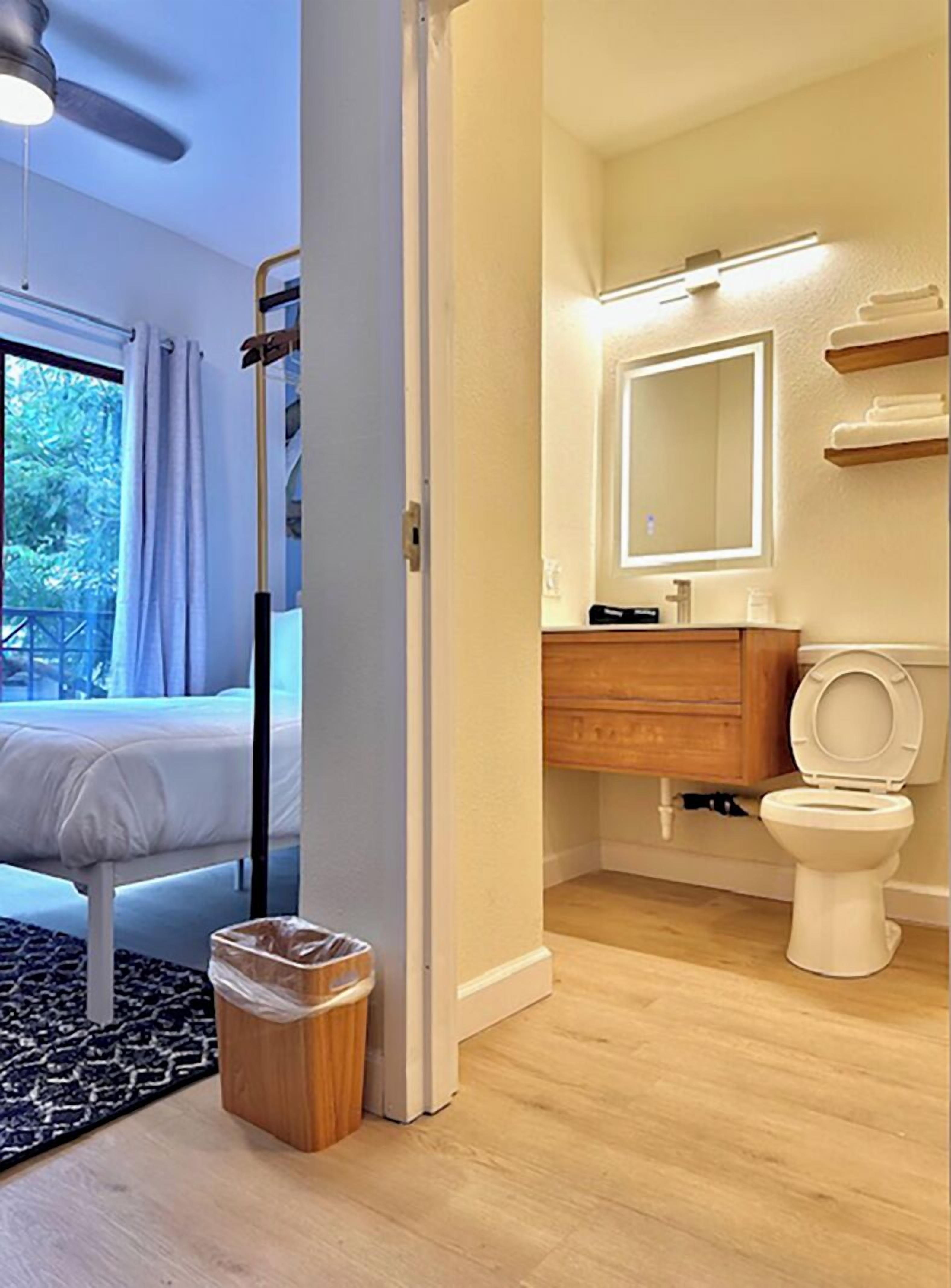 Full Bed Studio with Patio | Bathroom | Combined shower/bathtub, hair dryer, towels, soap