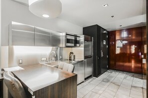 Fridge, microwave, stovetop, dishwasher - High Floor Studio Strip View w/Open Balcony | at Palms Place (Las Vegas)