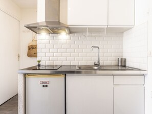 Fridge, microwave, cookware/dishes/utensils