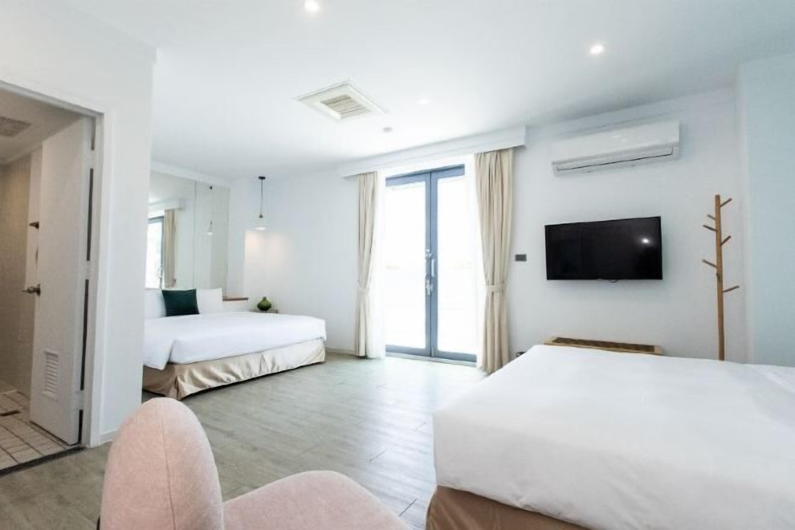 Desk, laptop workspace, blackout drapes, iron/ironing board