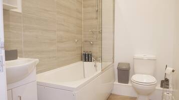 Hair dryer, towels, soap, shampoo