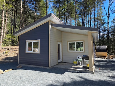 Charming cozy cabin tucked away in a peaceful corner of nature, perfect escape!
