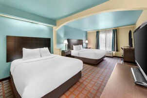 Room (1 King and 1 Queen Bed) | In-room safe, laptop workspace, iron/ironing board, free WiFi