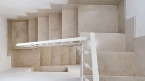A staircase with a white handrail and beige steps. - InCentro Exclusive Terrace Suite - Lecce Selection (Lecce)