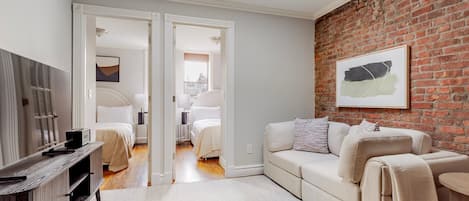 2 chambres, fer et planche à repasser, Wi-Fi, draps fournis