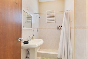 Shower, hair dryer, towels, soap