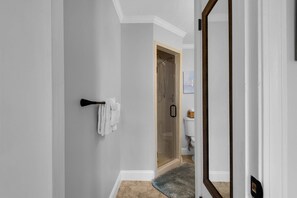 Shower, hair dryer, shampoo