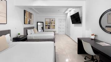 Desk, travel crib, free WiFi, bed sheets