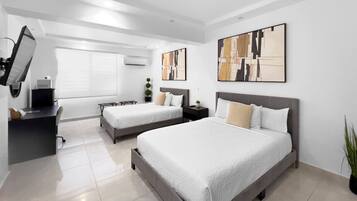 Desk, travel crib, free WiFi, bed sheets