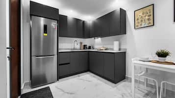 Fridge, microwave, stovetop, coffee/tea maker