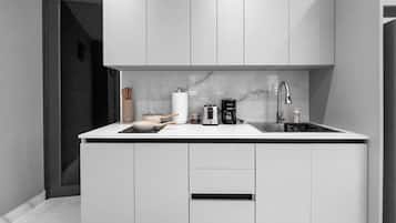 Fridge, microwave, stovetop, coffee/tea maker