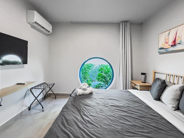 Desk, iron/ironing board, travel cot, free WiFi