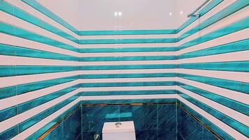 Deluxe Double or Twin Room | Bathroom | Shower, slippers, towels