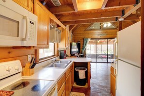 Fridge, microwave, stovetop, coffee/tea maker
