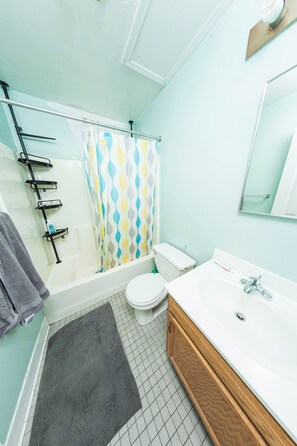 Hair dryer, towels, soap, shampoo