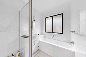 Shower, hair dryer, towels, soap