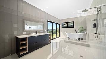 Shower, hair dryer, towels, shampoo