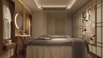 Relax in this serene bedroom with a central bed, vanity, and sink.