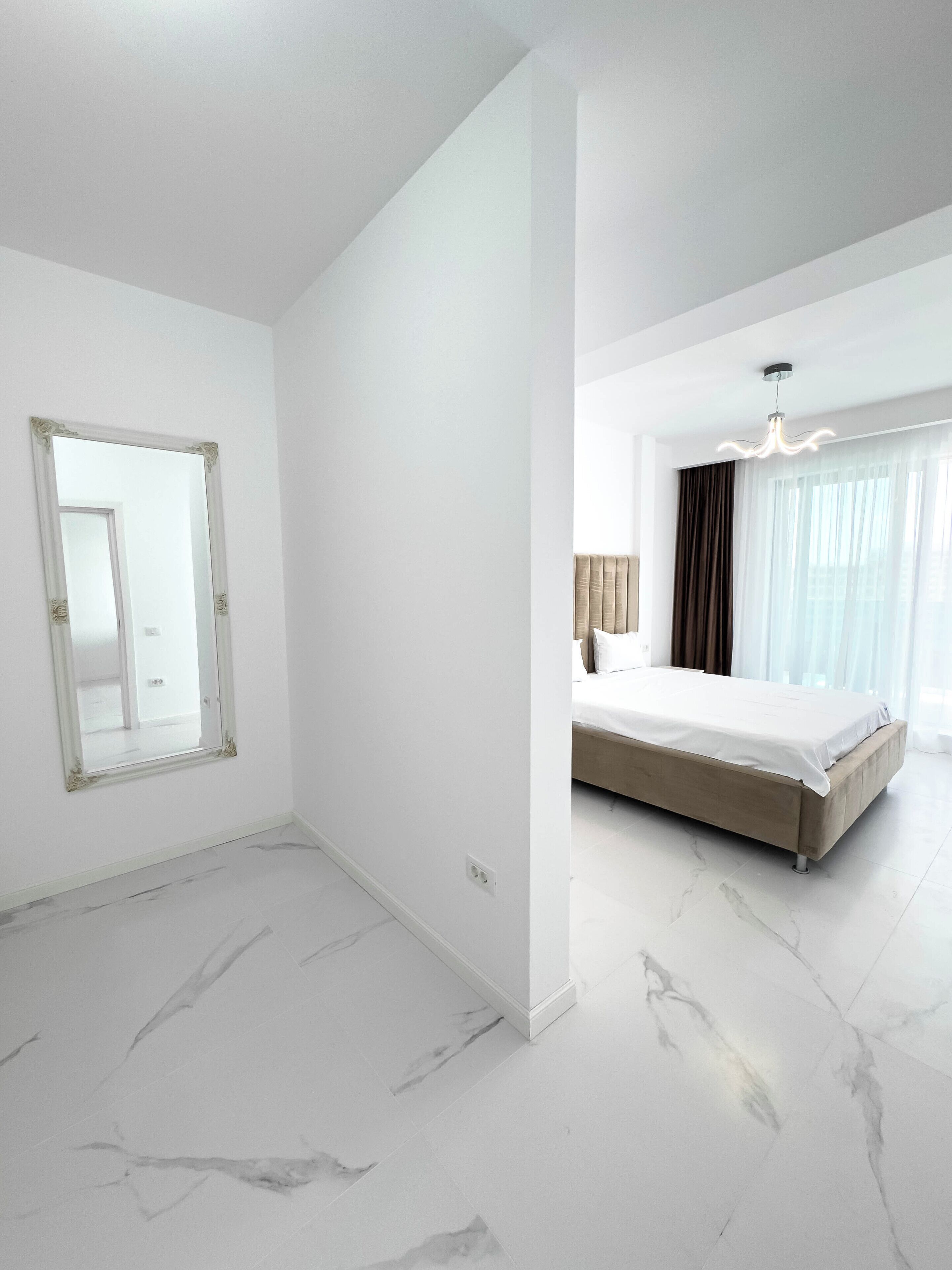 Departamento, balcón, vista parcial al mar | 1 habitación, cortinas blackout y tabla de planchar con plancha 