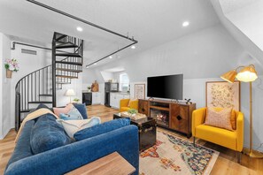 TV, fireplace, books