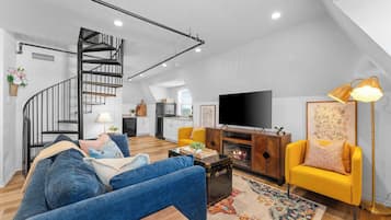 TV, fireplace, books