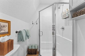 Shower, hair dryer, towels