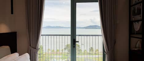 Exclusive Suite | Individually decorated, desk, blackout drapes, iron/ironing board