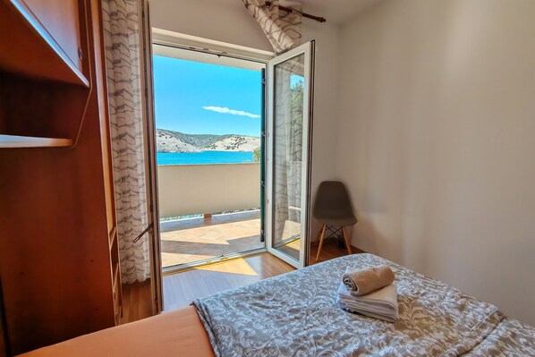 Apartamento família, vários quartos, de frente para o mar (Waves And Peace) | 2 quartos, Wi-Fi de cortesia, roupa de cama