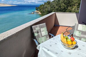 Apartamento família, vários quartos, de frente para o mar (Sunset By The Sea) | Sacada