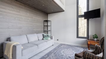 Superior maisonnette, Meerdere bedden, gedeeltelijk uitzicht op meer, aan piste | Woonkamer