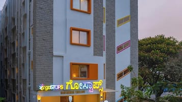 A multi-story hotel with a modern design, located in the heart of the city.