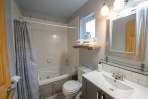 Hair dryer, towels, soap, shampoo