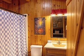 Shower, hair dryer, towels, shampoo