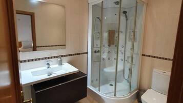 Hair dryer, bidet, towels, soap