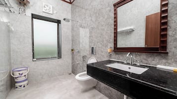 Shower, free toiletries, hair dryer, slippers