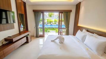 Deluxe Room, 1 Double Bed | Desk, bed sheets