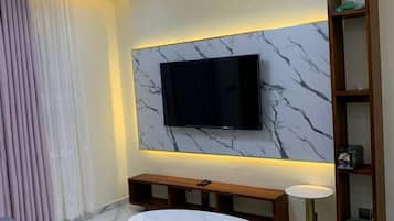 Family Condo, Balcony, City View | Living area