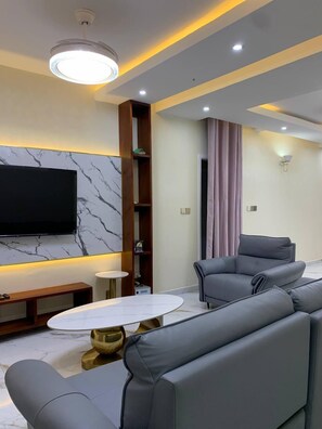 Family Condo, Balcony, City View | Living area