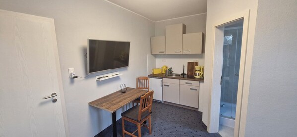 Fridge, coffee/tea maker, electric kettle, toaster