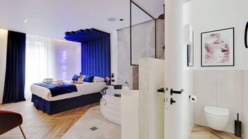 Shower, hair dryer, towels, shampoo